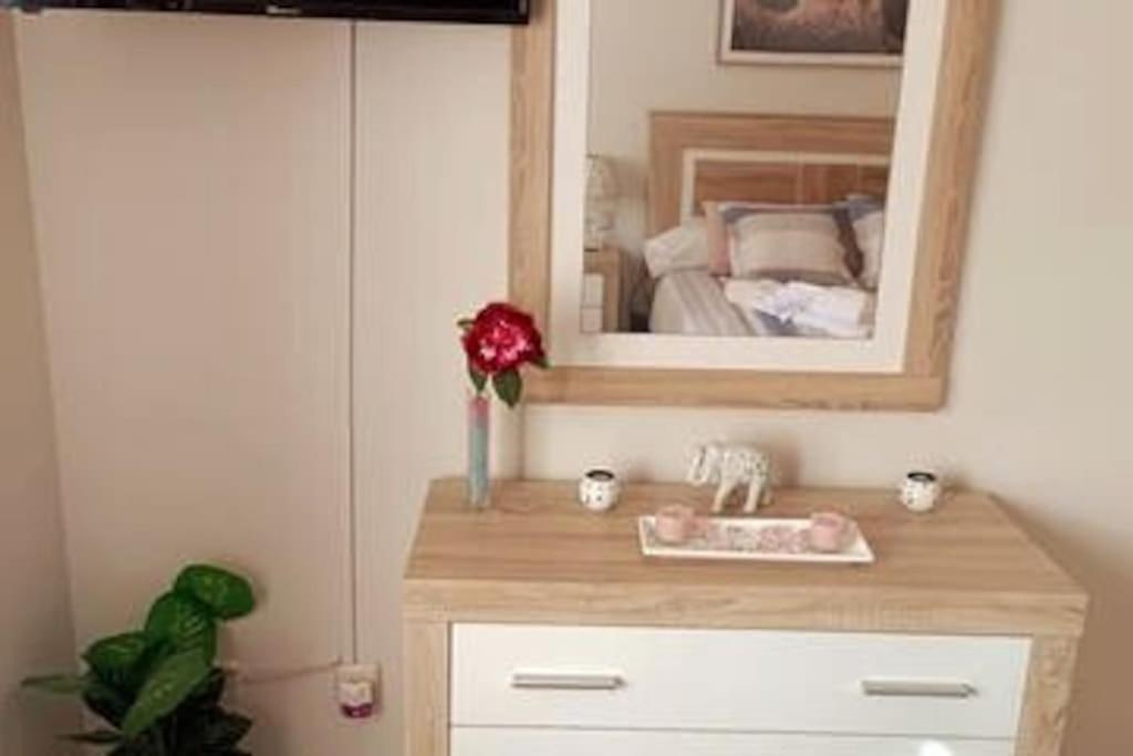 A bed or beds in a room at Acogedora y confortable casa familiar en L'Olleria