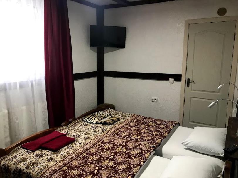 Postel nebo postele na pokoji v ubytování Fayniy Motel