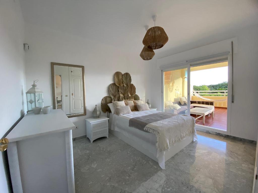 Postel nebo postele na pokoji v ubytování Apartamentos Costa Quebrada