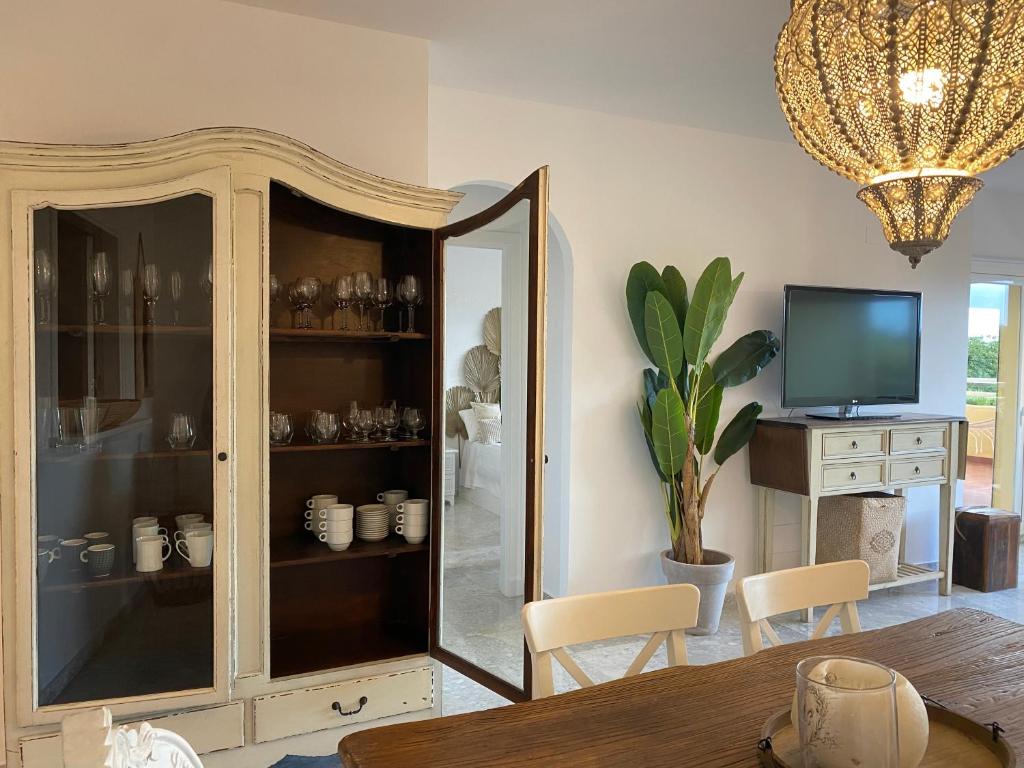 TV a/nebo společenská místnost v ubytování Apartamentos Costa Quebrada