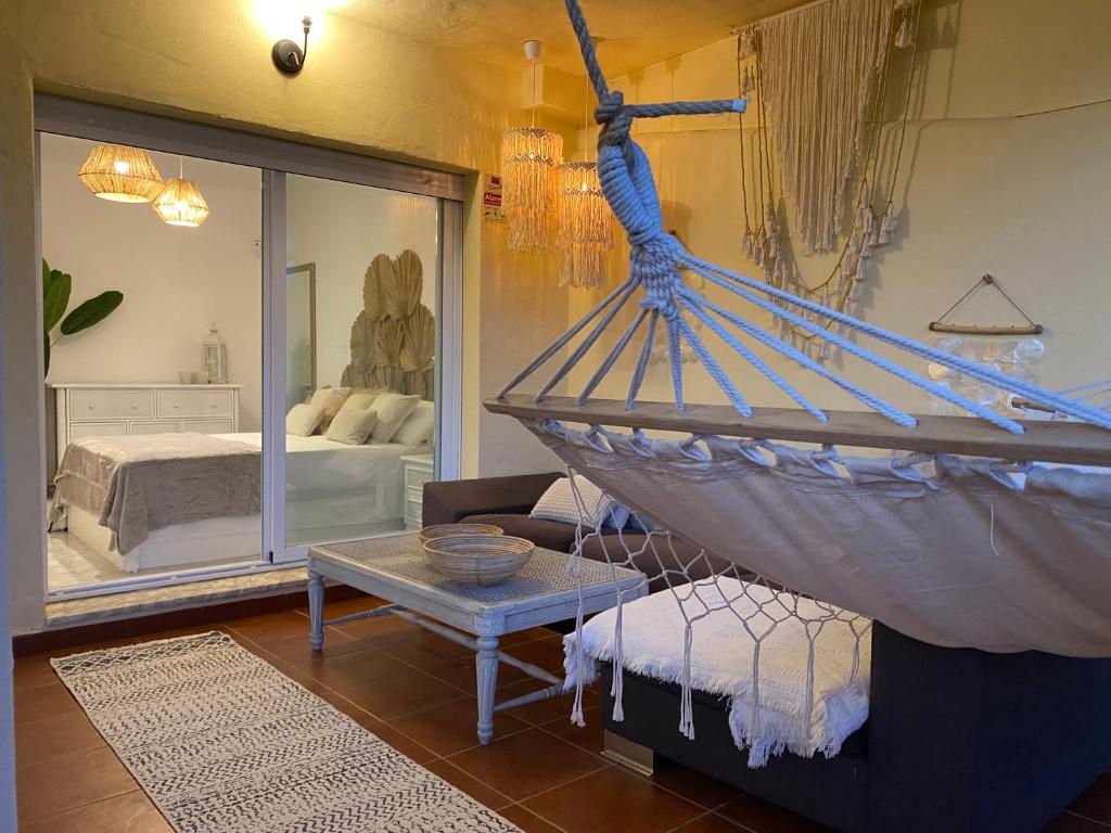 Postel nebo postele na pokoji v ubytování Apartamentos Costa Quebrada