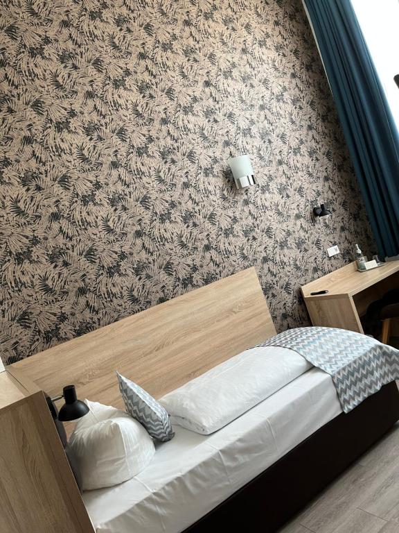 Postel nebo postele na pokoji v ubytování Hotel LACIN