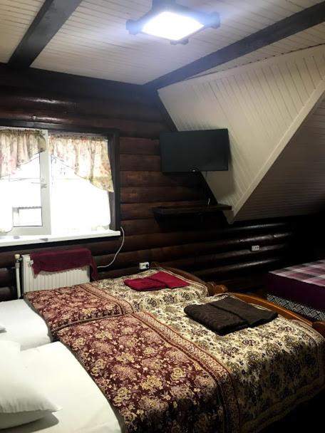 Postel nebo postele na pokoji v ubytování Fayniy Motel