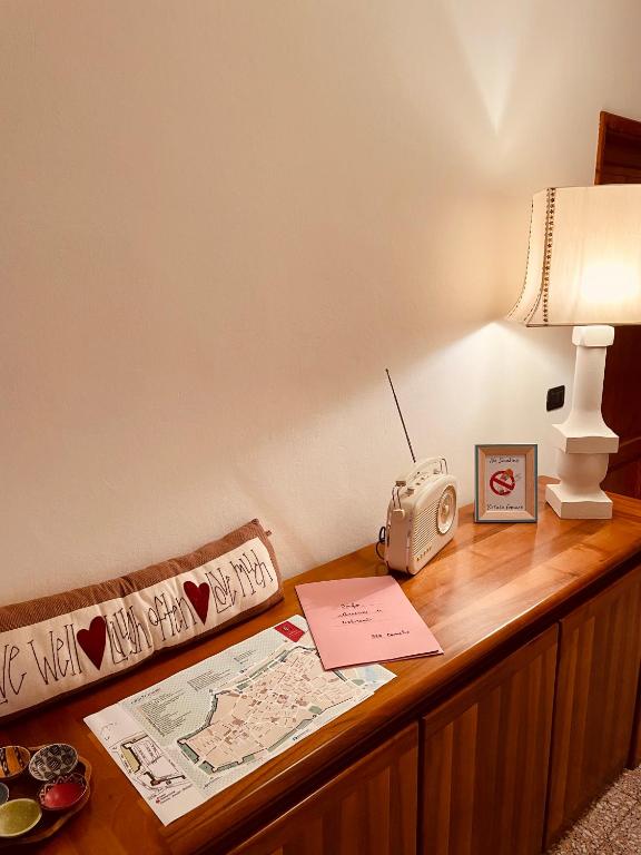 Łóżko lub łóżka w pokoju w obiekcie B&B Camelia