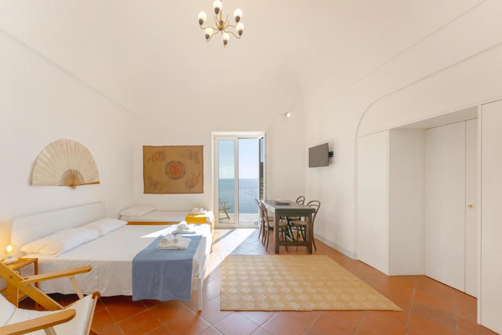 Postel nebo postele na pokoji v ubytování TORRETTA CORRICELLA- Punta dei Monaci