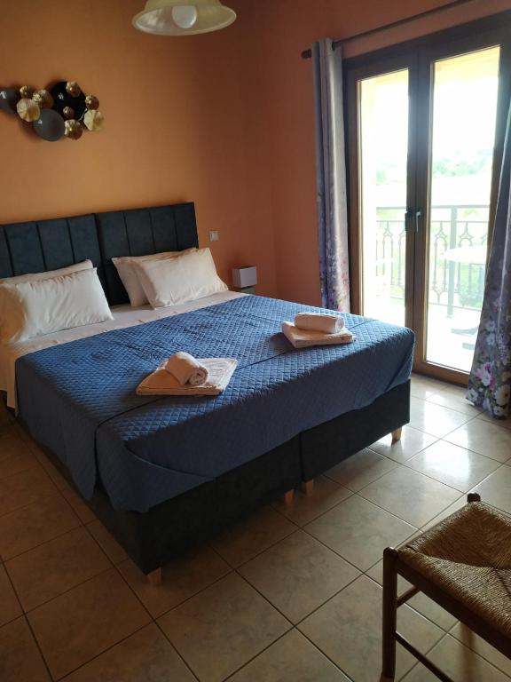 Postel nebo postele na pokoji v ubytování Athena Studios