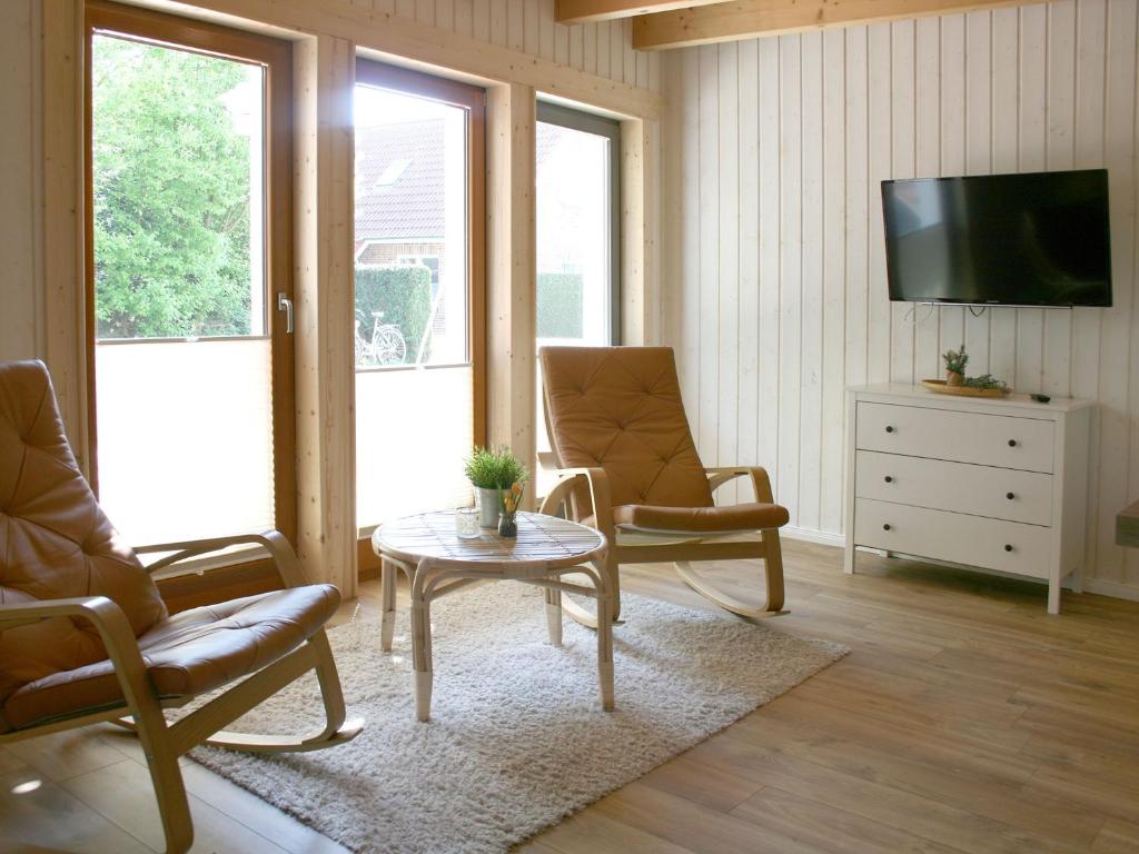 TV a/nebo společenská místnost v ubytování Apartments im Schwedenstil