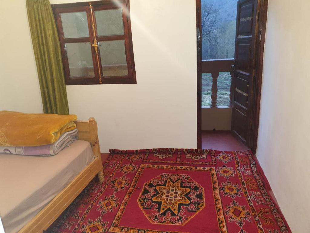 Postel nebo postele na pokoji v ubytování Guest House Imdoukal