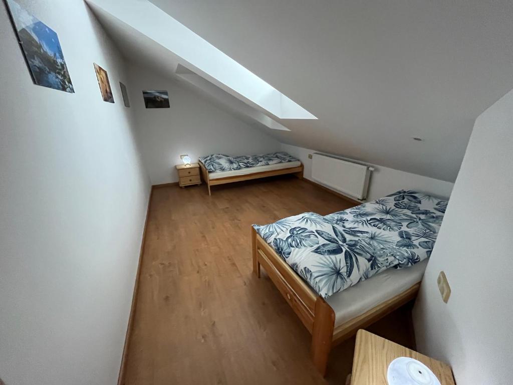 Postel nebo postele na pokoji v ubytování Apartmán U Póla