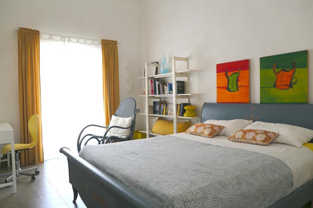 Łóżko lub łóżka w pokoju w obiekcie Trìcora Sicilian B&B