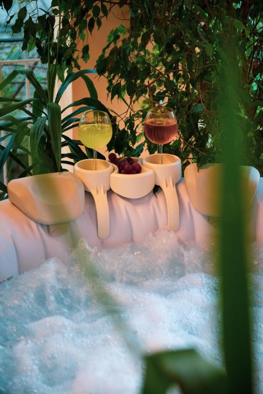 a group of bowls of food sitting on a table at Luxury katrinas apartment with outdoor jacuzzi in Corfu