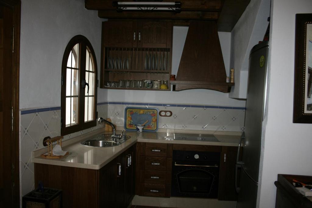 Kuchyň nebo kuchyňský kout v ubytování Casa Lentegí