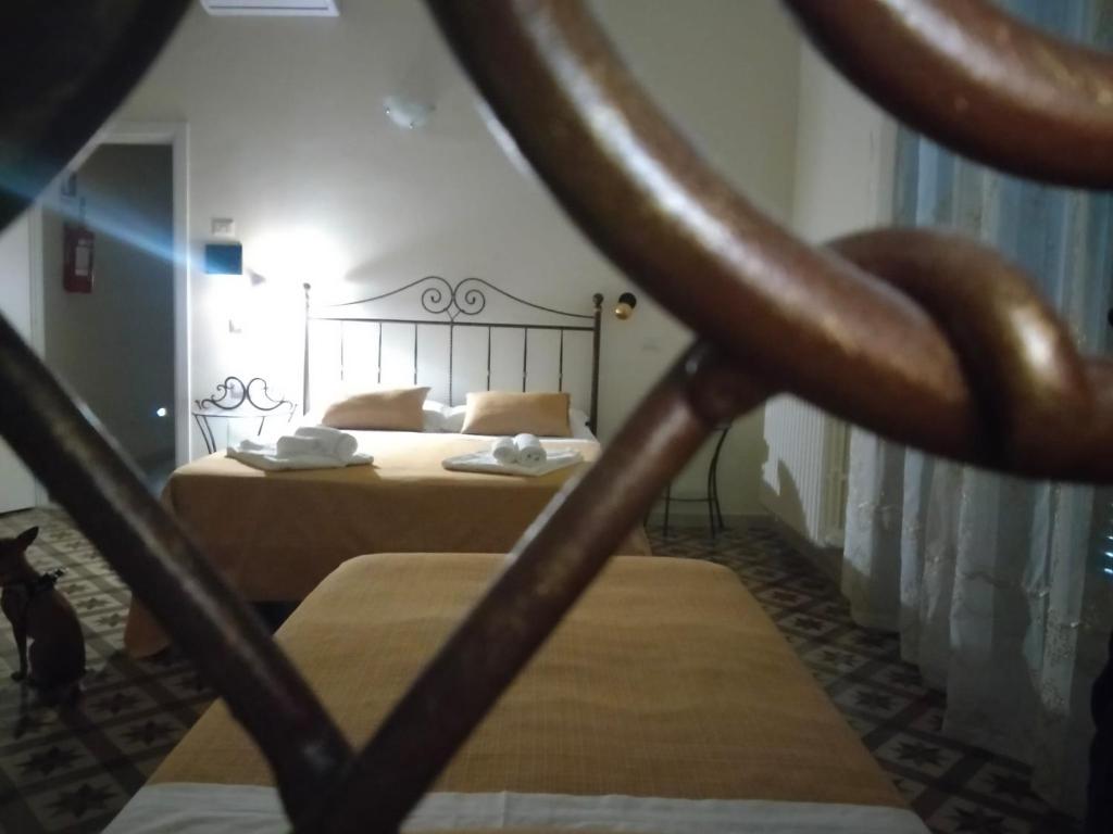 Postel nebo postele na pokoji v ubytování Pietre e Sassi