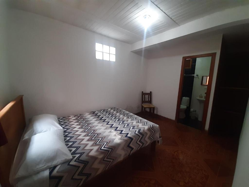 Postel nebo postele na pokoji v ubytování CAFE RACER HOSTEL