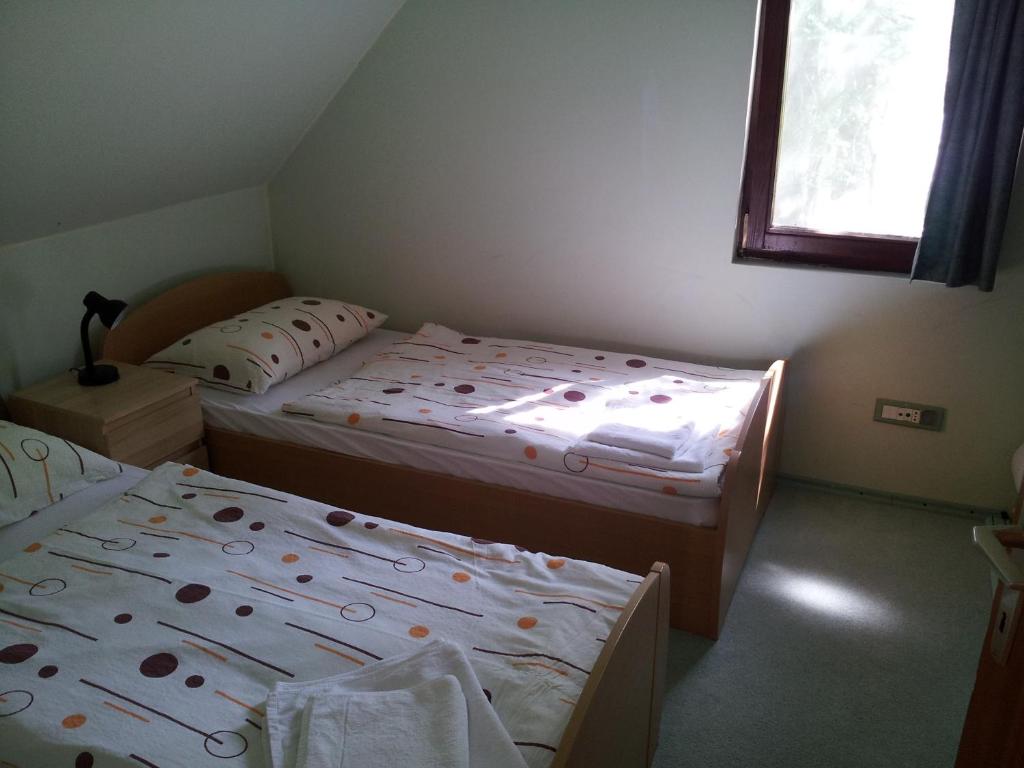 Postel nebo postele na pokoji v ubytování Apartment Lake Bohinj no. 5