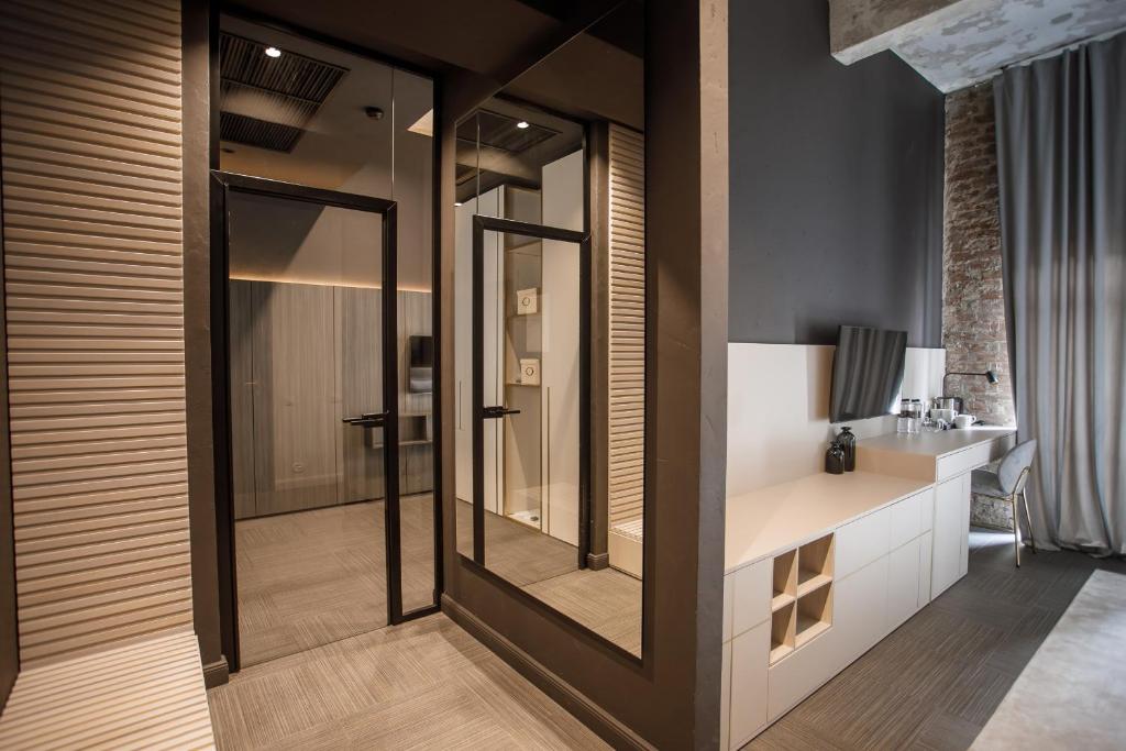 Postel nebo postele na pokoji v ubytování Victoria Deluxe Hotel