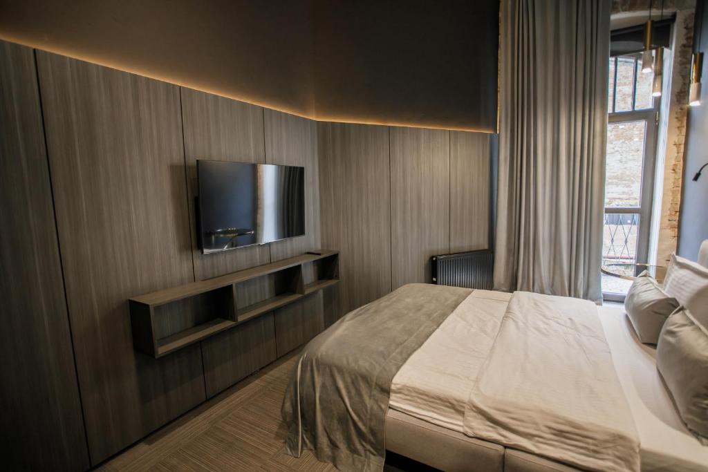 TV a/nebo společenská místnost v ubytování Victoria Deluxe Hotel