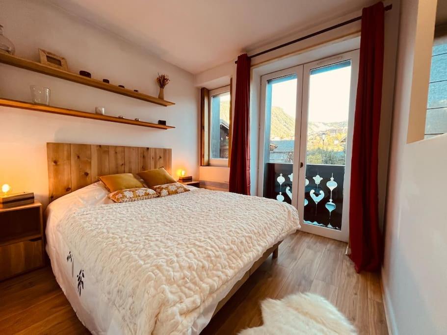Posteľ alebo postele v izbe v ubytovaní Superbe appartement COURCHEVEL VILLAGE