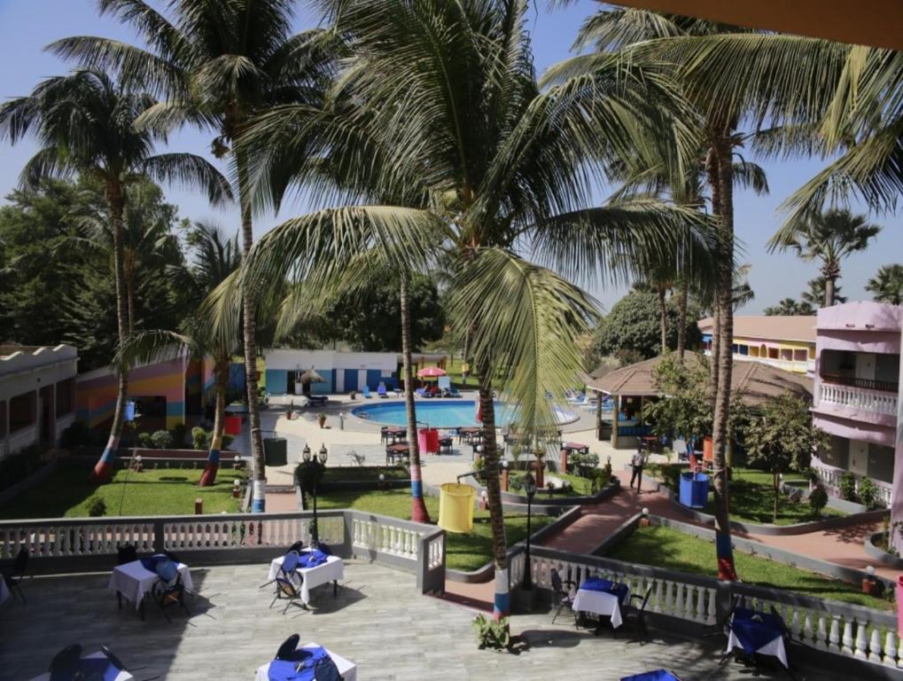 a view of the pool from the balcony of a resort at Mansea Beach Hotel in Kololi