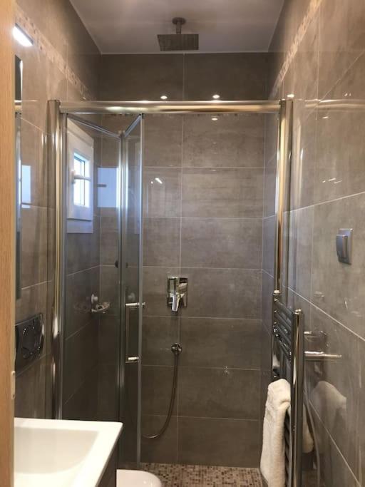 Kúpeľňa v ubytovaní Tiny Deluxe Suite in Kalamaria