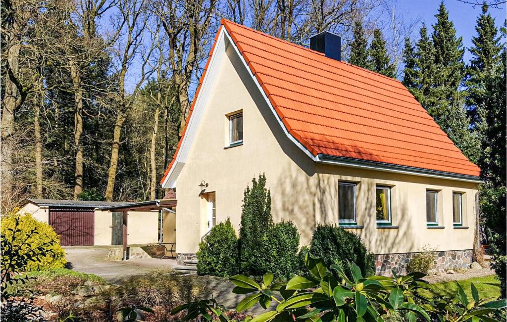an orange roofed house with an orange roof at Pet Friendly Home In Brekendorf With Kitchen in Brekendorf