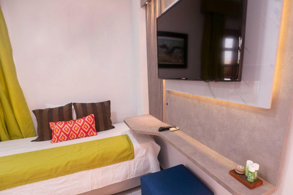 Postel nebo postele na pokoji v ubytování Hotel Santa Fe