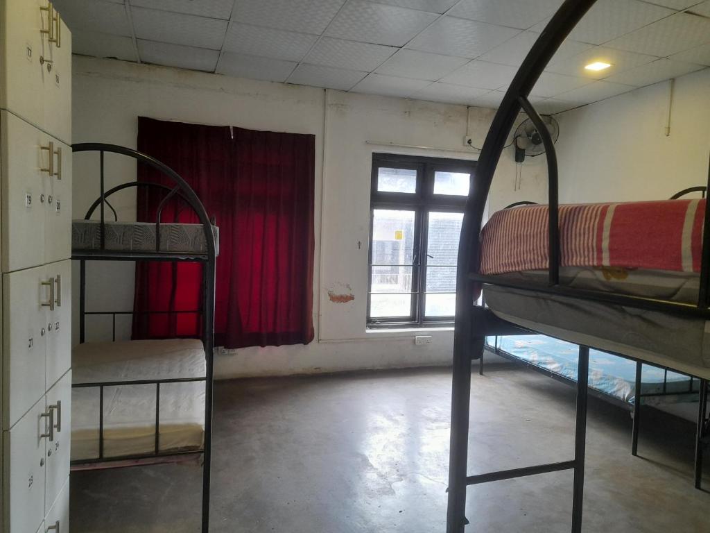 Postel nebo postele na pokoji v ubytování City View Hostel