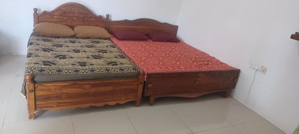 Postel nebo postele na pokoji v ubytování 20 House Villa