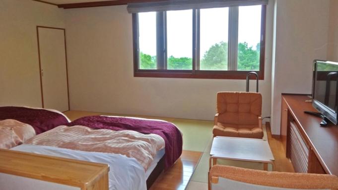 Postel nebo postele na pokoji v ubytování Kyukamura Tsumagoi-Kazawa
