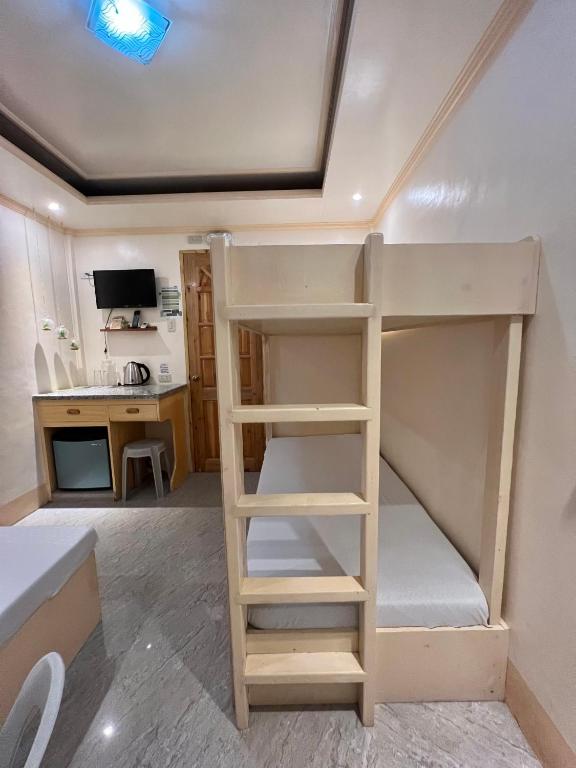 Kuchyň nebo kuchyňský kout v ubytování Palompon Sugar's Inn
