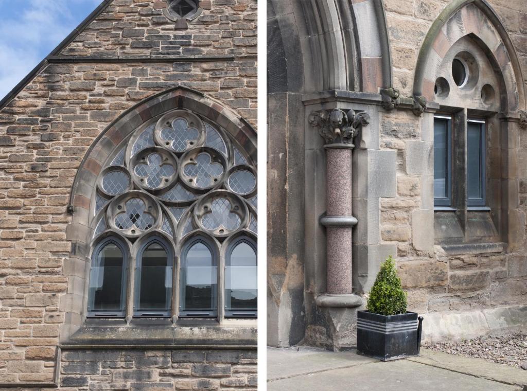 a building with a window and a plant in front of it at Edinburgh Church Apartments in Edinburgh