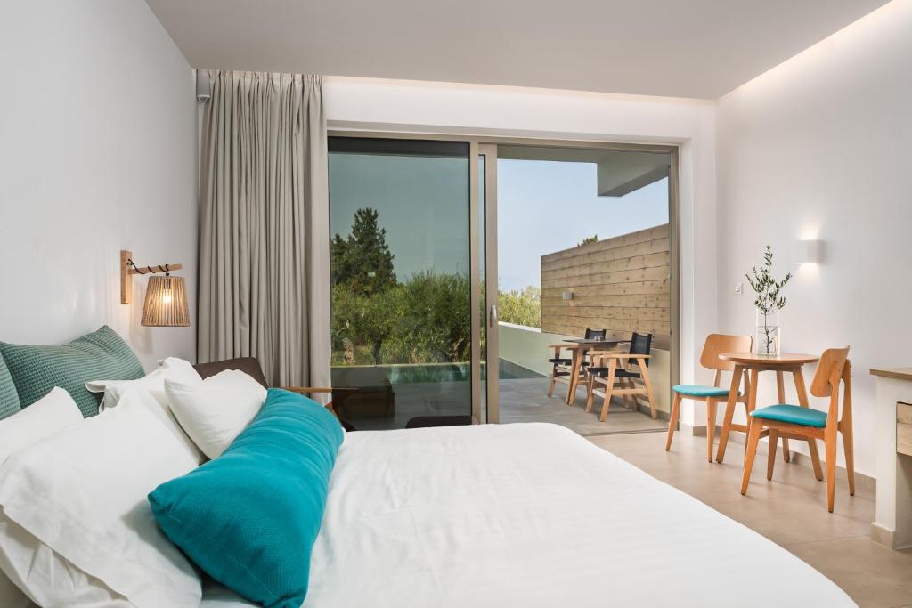 Postel nebo postele na pokoji v ubytování Tsamis Zante Suites