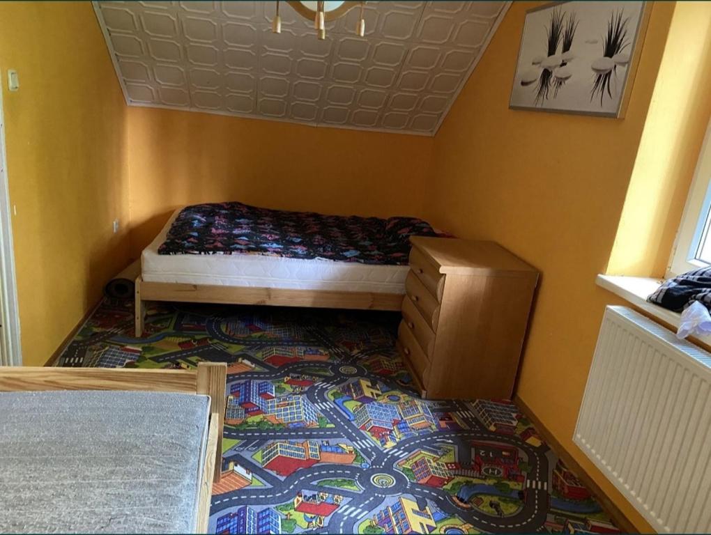 Postel nebo postele na pokoji v ubytování Domek w Przejmie