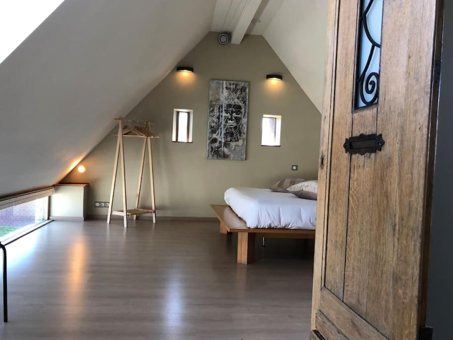 Postel nebo postele na pokoji v ubytování Aux Portes de Durbuy