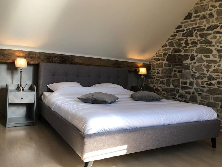 Postel nebo postele na pokoji v ubytování Aux Portes de Durbuy