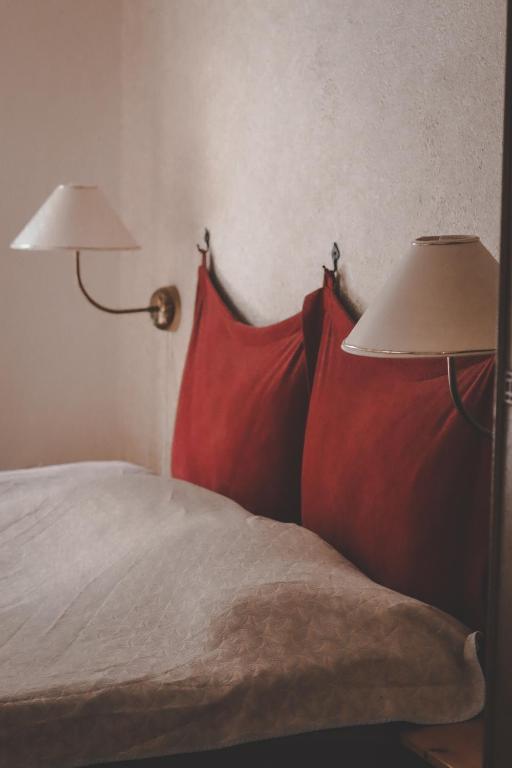 Postel nebo postele na pokoji v ubytování Samblatalu Homestay