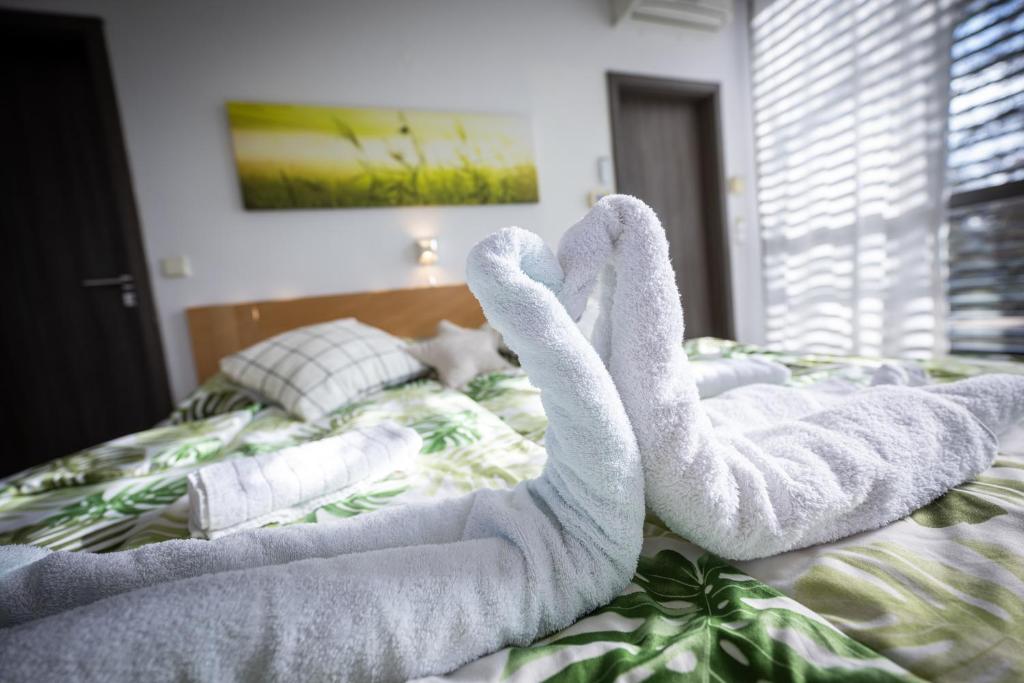 Postel nebo postele na pokoji v ubytování Atelier Lanna