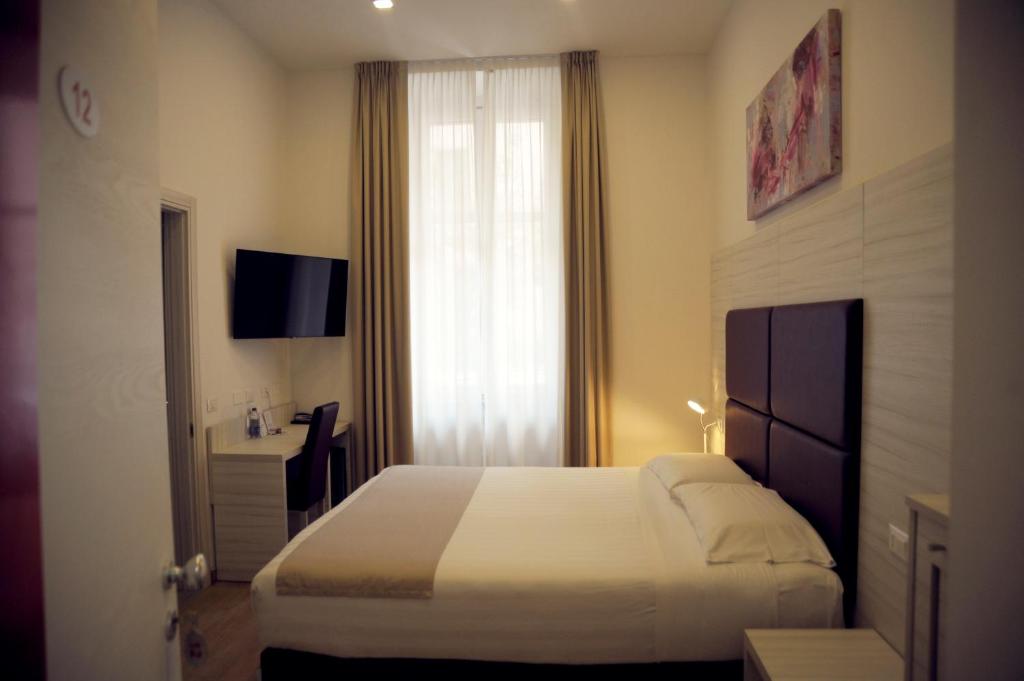 Telewizja i/lub zestaw kina domowego w obiekcie Hotel Fioralba