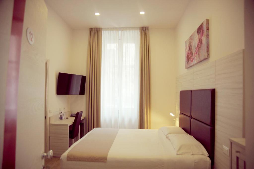 Telewizja i/lub zestaw kina domowego w obiekcie Hotel Fioralba