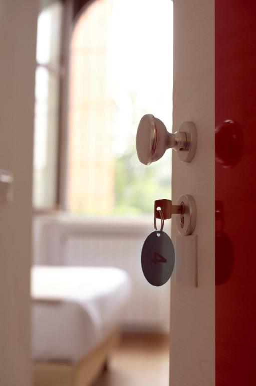Łóżko lub łóżka w pokoju w obiekcie Hotel Fioralba