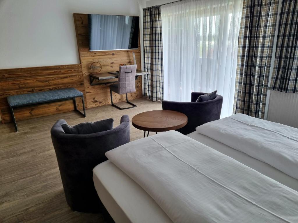Postel nebo postele na pokoji v ubytování Hotel Beinbauer