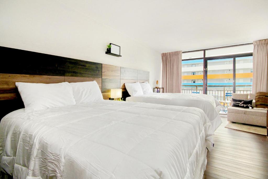 Posteľ alebo postele v izbe v ubytovaní Landmark Resort 1208