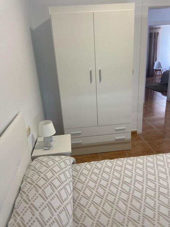 Postel nebo postele na pokoji v ubytování ALOJAMIENTO Rural AVD SIERRA MÁGINA