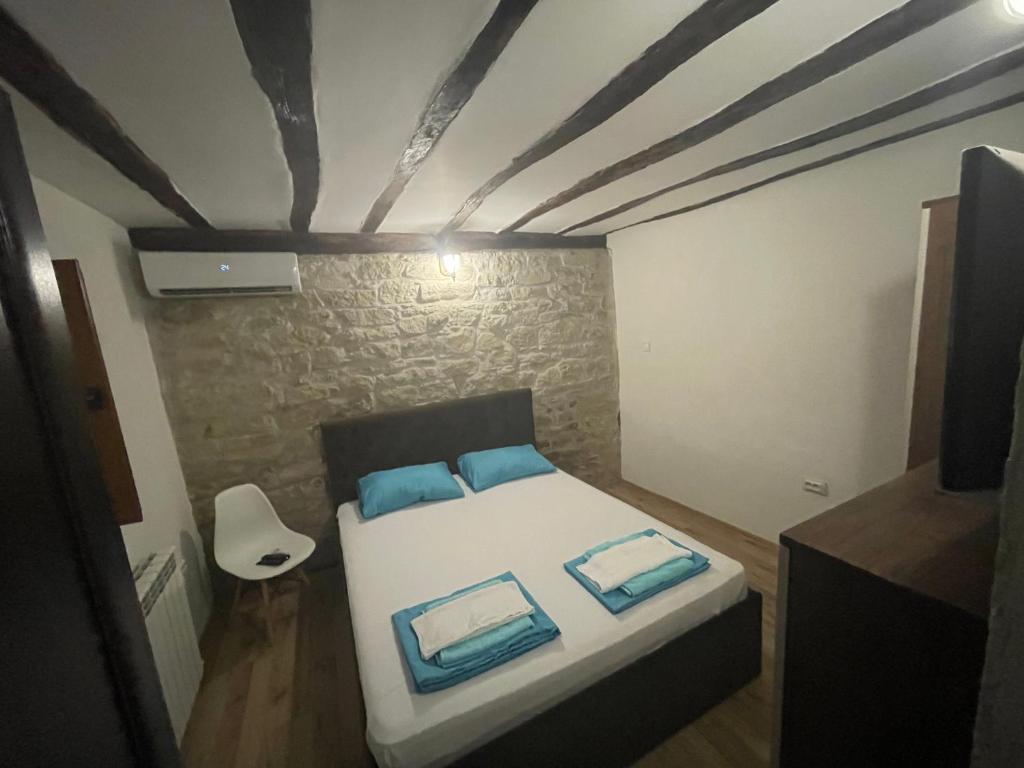Postel nebo postele na pokoji v ubytování DeTY’s Guest House