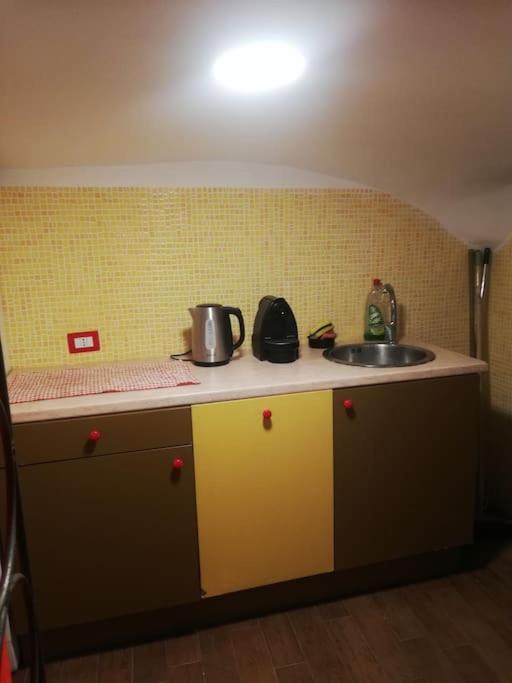 Kuchyňa alebo kuchynka v ubytovaní Capa e Coda Appartamento in centro storico