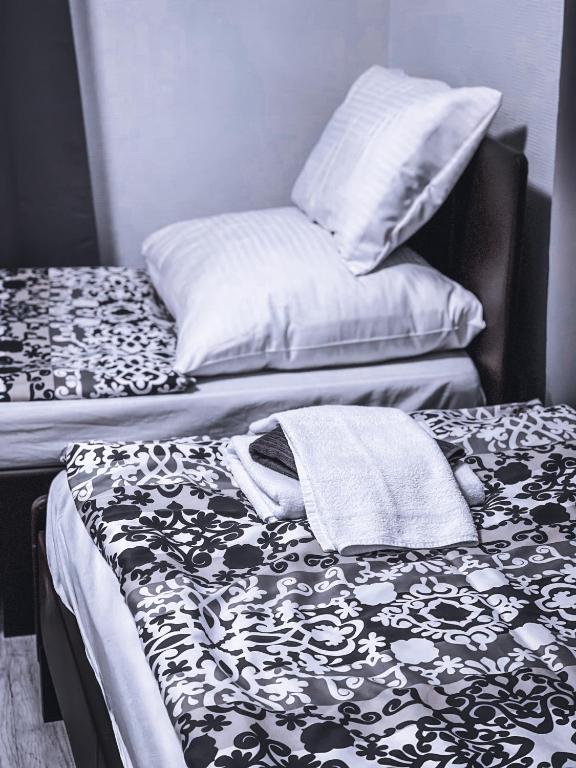 Posteľ alebo postele v izbe v ubytovaní Végvári Hotel Eger