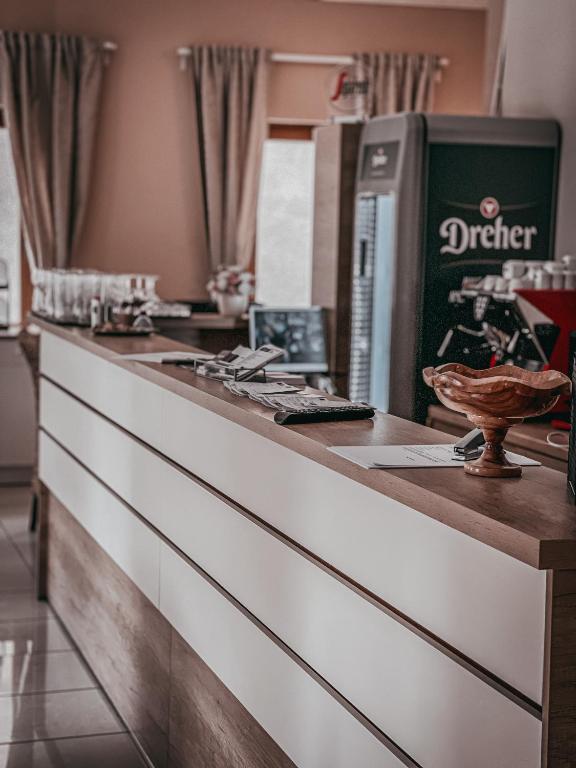 Nápoje v ubytovaní Végvári Hotel Eger