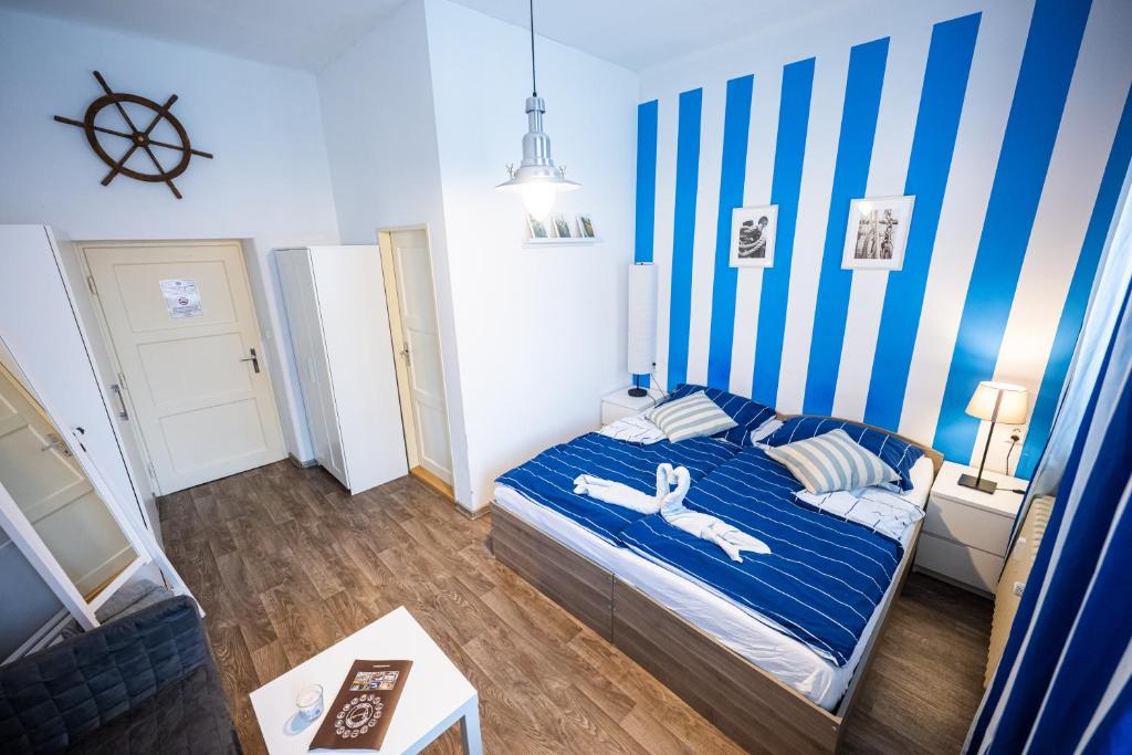 Postel nebo postele na pokoji v ubytování Apartmány Lanna