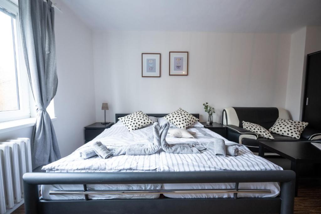 Postel nebo postele na pokoji v ubytování Apartmány Lanna