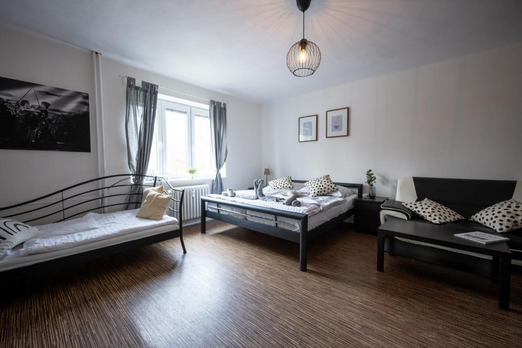 Postel nebo postele na pokoji v ubytování Apartmány Lanna
